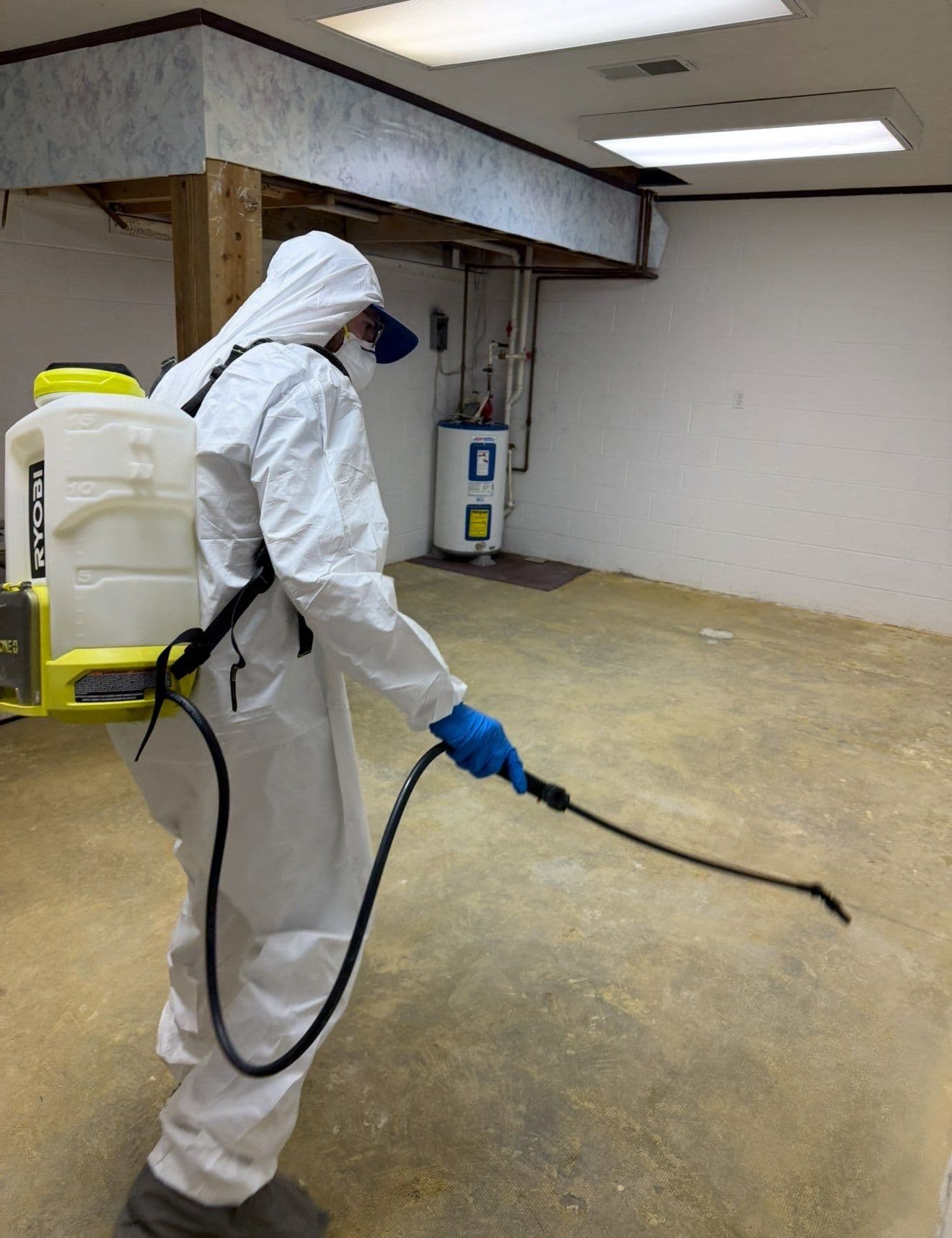 HEPA-filtered antimicrobial application during IICRC S520 mold remediation in a residential basement